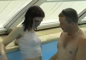 Sister sucks her brother on the poolside